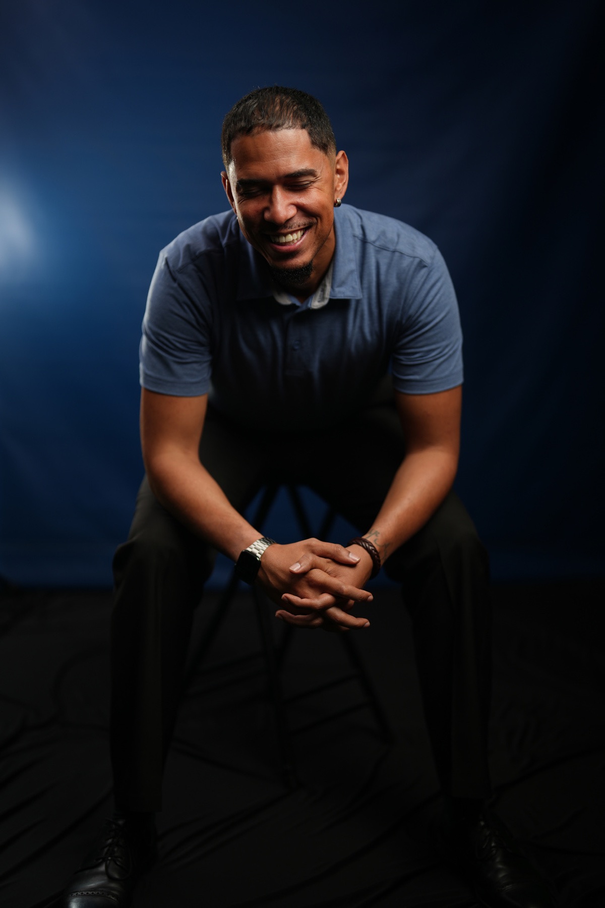 Dorian Liriano seated, candid portrait